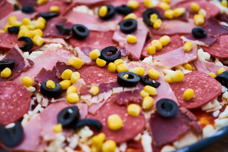 Meat lovers pizza loaded with multiple meats