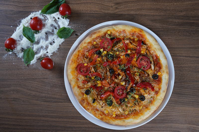 Build your own pizza station with fresh ingredients