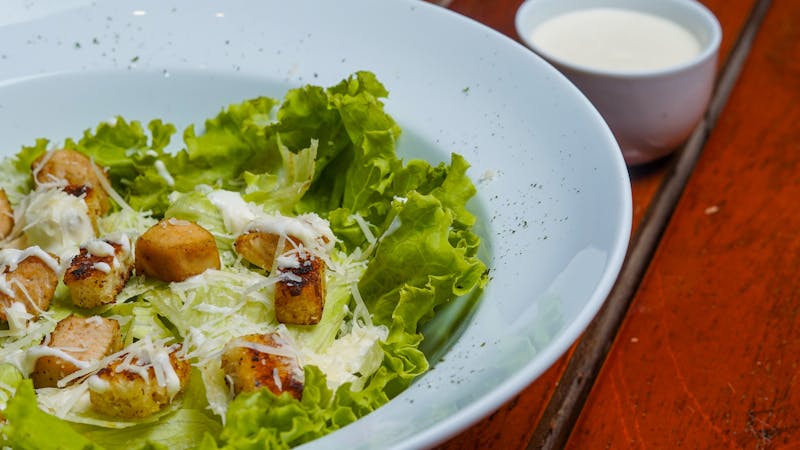 Classic Caesar salad with croutons and Parmesan