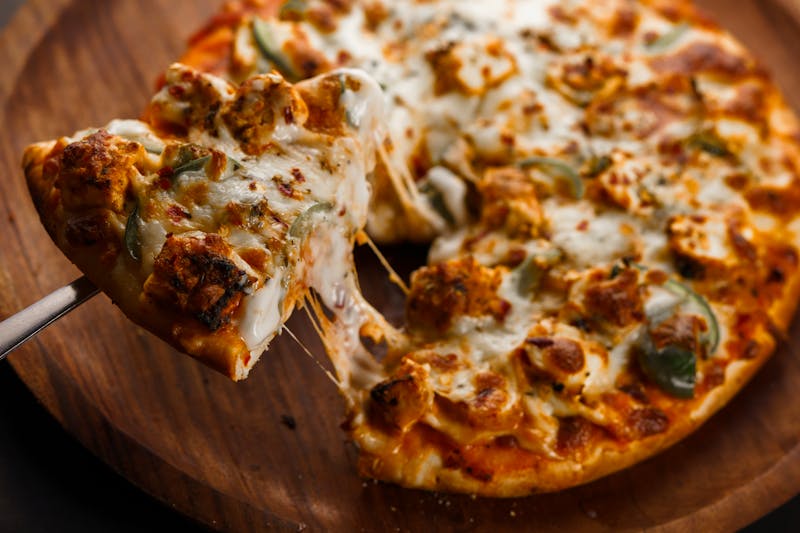 Three-cheese classic pizza with golden bubbly top